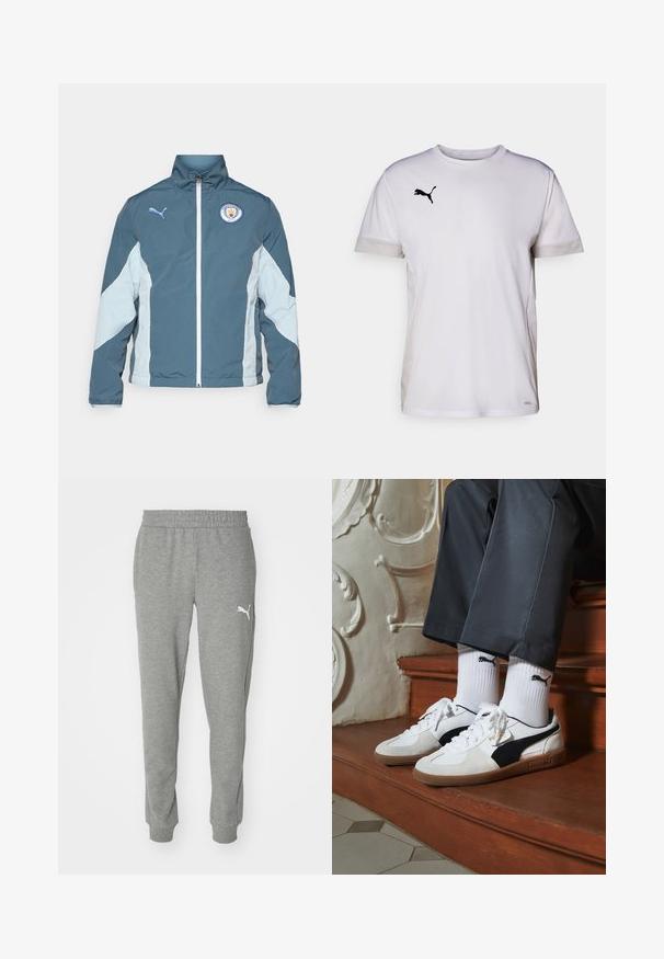Jakna na vjetar u tamno plavoj i svijetloplavoj boji, sa zatvaranjem na zip, visokim ovratnikom i logotipom Manchester City na prsima.; Bijela sportska majica kratkih rukava s okruglim izrezom, koja sadrži prozračne mrežaste detalje sa strane i crni Puma logo na prsima.; Sive trenirke od mekanog materijala, s elastičnim pojasom, sužavajućim nogavicama i bijelim logotipom na lijevom bedru.; Puma tenisice u bijelom i crnom nubuku, s smešnim gumastim potplatom. Uparene su s bijelim čarapama s crnim logom, nosene uz tamne hlače.