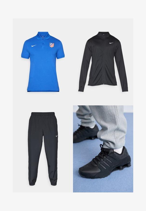 Jacket desportivo preto com mangas longas, colarinho e fecho zip completo. Apresenta um discreto logotipo da Nike em branco na parte superior do lado esquerdo do peito. Textura suave.; Camisa polo azul feita de algodão, com colarinho, presilha de três botões, mangas curtas e um logótipo de clube vermelho e amarelo no lado esquerdo do peito.; Calças de treino pretas feitas de um tecido leve, com um cós elástico, punhos nos tornozelos e um discreto logótipo da Nike no lado esquerdo.; Pessoa vestindo tênis Nike Shox pretos e calças de moletom cinzas, de pé em um tapete azul claro.