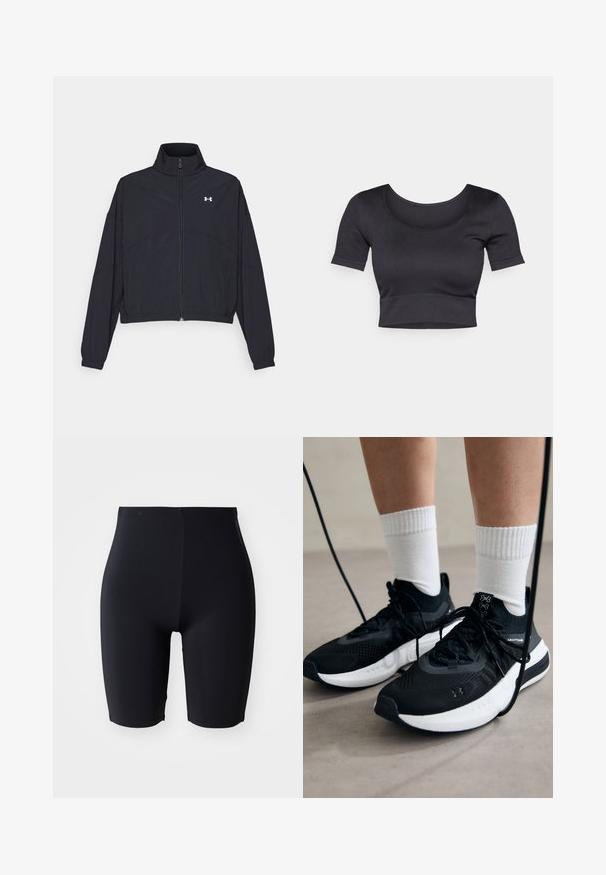 Giacca nera con zip e colletto alto, polsini e orlo elastici. Presenta una texture liscia e un piccolo logo bianco sul petto.; Top corto a coste nero con maniche corte, scollatura rotonda ampia e fascia aderente nella parte inferiore. Tessuto morbido, design informale.; Pantaloni corti neri aderenti realizzati in un materiale liscio e elasticizzato. Presentano una vita alta e un design elegante e minimalista senza chiusure visibili.; Scarpe sportive nere con tessuto testurizzato, suola bianca e lacci neri. Indossate con calzini bianchi a costine, in piedi su una superficie chiara.