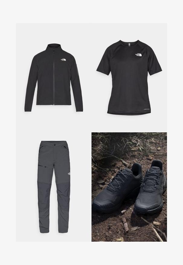 Jachetă neagră cu guler înalt, fermoar frontal și țesătură texturată. Dispune de un logo în partea stângă sus și o buzunar pe manșetă.; Tricou athletic scurt, de culoare neagră, cu un material texturat, având un logo alb pe partea stângă a pieptului și un tiv drept.; Pantaloni gri de exterior cu o textură netedă, având un buzunar cu fermoar pe lateral, zone de genunchi întărite și un detaliu subtil cu logo.; Pantofi sport negri, cu un superior din tricot texturat, vârf întărit și talpă cu amortizare, expuși pe un teren pământos cu crenguțe împrăștiate.