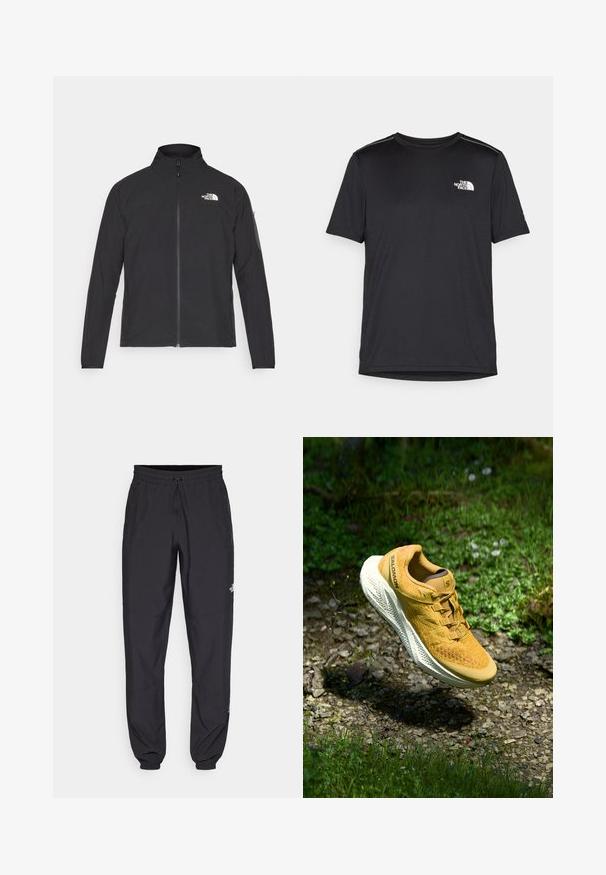 Črna jakna z visokim ovratnikom, sprednjim zadrgo in teksturirano tkanino. Ima logo na zgornji levi strani in stranski žep na rokavu.; Črna kratkosleevena majica iz lahkotnega materiala. Ima majhen bel logo na levem prsnem delu in diskretne poudarke na ramenskem predelu.; Črne atletske hlače iz lahkega materiala, ki imajo elastični pas z vezalko, stranske žepe in zožene manšete na gležnjih.; Rumene tekaške čevlje Salomon lebdijo nad kamenito stezo, obkroženi z zeleno travo in malimi divjimi cvetlicami v naravni svetlobi.