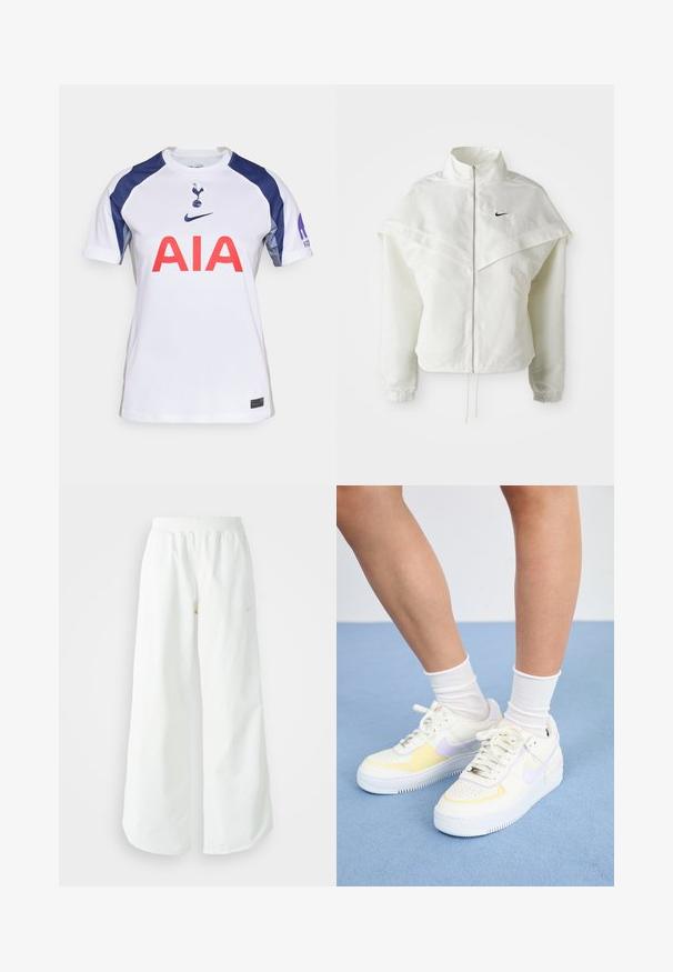 Biela bunda s dlhým rukávom na zips a vysokým golierom, s plášťovým detailom cez plecia, elastickými manžetami a malým čiernym logom Nike na hrudi.; Biely futbalový dres s krátkym rukávom a námorníckymi akcentmi, s okrúhlym výstrihom, veľkým červeným logom "AIA" a tímovým erbom na hrudi.; Biele široké športové nohavice s ribbovaným pásom a jemným logom. Hladká tkanina s uvoľneným strihom a zúženým lemom.; Biele kožené tenisky s žltými a levanduľovými akcentmi, okrúhle špičky, ploché šnúrky a textúrovaná gumová podrážka. Nosené s bielymi ponožkami.