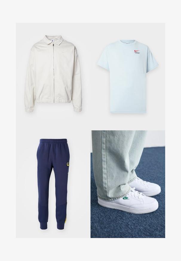 Casaco Nike branco e leve, com gola, fecho frontal, punhos elásticos e um pequeno logótipo no lado esquerdo do peito. Textura suave.; Camiseta de algodão azul clara com mangas curtas, gola redonda e um logo da Nike em vermelho. O texto diz "DEPARTAMENTO ATLÉTICO. APENAS FAÇA."; Calças de moletom azul-marinho com cintura elástica, bolsos laterais e um logo em patch preto/amarelo, apresentando painéis texturizados perto dos tornozelos.; Tênis de couro brancos com logo verde da Nike, bico redondo, sola plana, combinados com calças de denim azul claro, exibidos sobre um tapete azul.