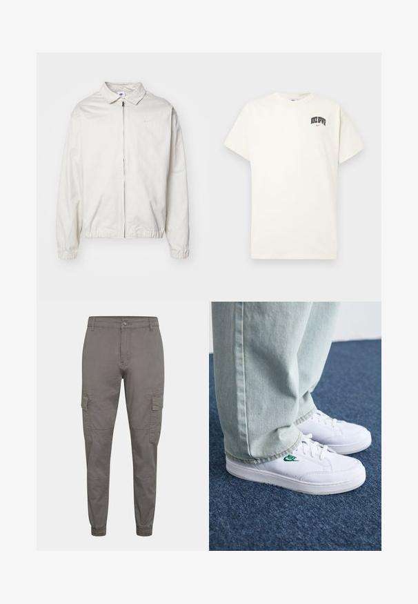Bela, lahka Nike jakna z ovratnikom, sprednjim zadrgo, elastičnimi manšetami in majhnim logotipom na levem prsnem delu. Gladka tekstura.; Kremasta bombažna majica s kratkimi rokavi, z natisnjenim napisom "NIKE SB" v črni in rdeči barvi na prsih. Standardni okrogli izrez.; Sive cargo hlače iz bombaža z elastičnim manšetnim delom, imajo stranske žepe, sprednje zapiranje na gumb in šivano zasnovo.; Bela usnjena športna obutev z zelenim Nike logotipom, okrogla konica, ravna podplat, v kombinaciji z svetlo modrimi kavbojkami, prikazana na modrem preprogu.