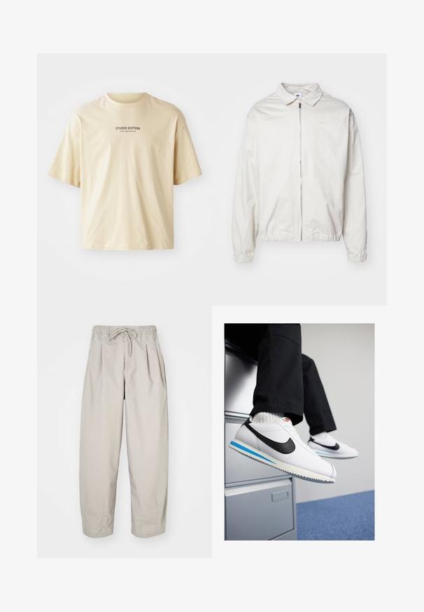 Bela, lahka Nike jakna z ovratnikom, sprednjim zadrgo, elastičnimi manšetami in majhnim logotipom na levem prsnem delu. Gladka tekstura.; Bež bombažna majica s kratkimi rokavi in okroglim ovratnikom, z napisom "STUDIO EDITION" v črni barvi čez prsni del.; Bež hlače iz lahkega materiala z elastičnim pasom in vrvico. Imajo gube in ohlapen kroj, izdelane so iz mehkega, gladkega blaga.; Bele usnjene teniske z črnim Nikeovim simbolom, svetlo modrim in sivo gumijastim podplatom ter klasičnim vezalnim dizajnom. Noge so poležane na omarici za dokumente.