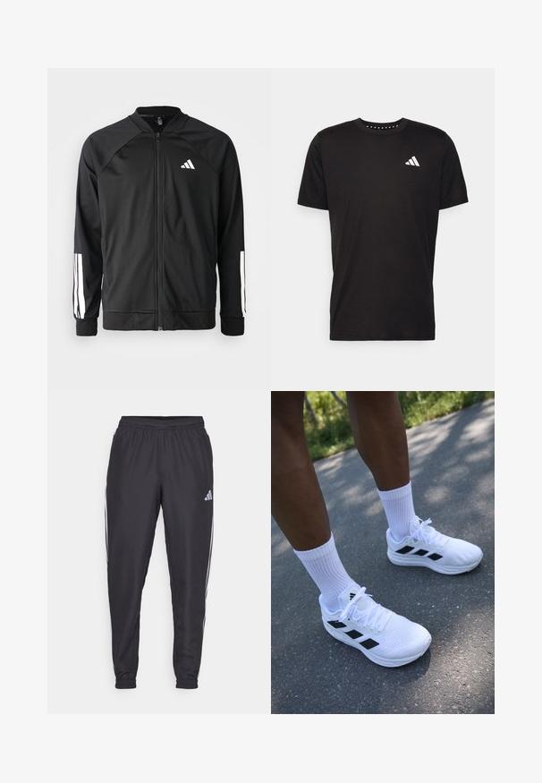 Veste de sport noire avec fermeture éclair à l'avant, manches raglan, logo Adidas blanc et bandes blanches sur les manches. Tissu lisse avec des poignets élastiques.; T-shirt en coton noir à manches courtes, décolleté rond et logo blanc sur la poitrine gauche. Texture lisse et design simple.; Pantalons de sport noirs avec une taille élastique, présentant des rayures blanches sur les côtés et un petit logo sur la hanche. Texture lisse.; Baskets de sport blanches avec des accents noirs, dessus en mailles et lacets blancs. Portées avec des chaussettes blanches côtelées, positionnées sur une surface en béton.
