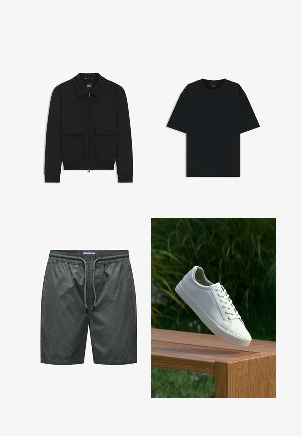 Giacca bomber nera con colletto, chiusura a zip frontale e due grandi tasche con patta. Presenta polsini e orlo a costine, realizzata in tessuto testurizzato.; Maglietta in cotone nera con scollatura rotonda e maniche corte. Presenta una vestibilità ampia e un design semplice senza motivi o dettagli.; Pantaloni verdi realizzati in tessuto leggero, con cintura elasticizzata e cordoncino, caratterizzati da una superficie liscia e un design semplice.; Sneaker bianco con lacci sospeso sopra una panchina di legno, con fogliame verde sullo sfondo, che mette in mostra il design e la texture della scarpa.