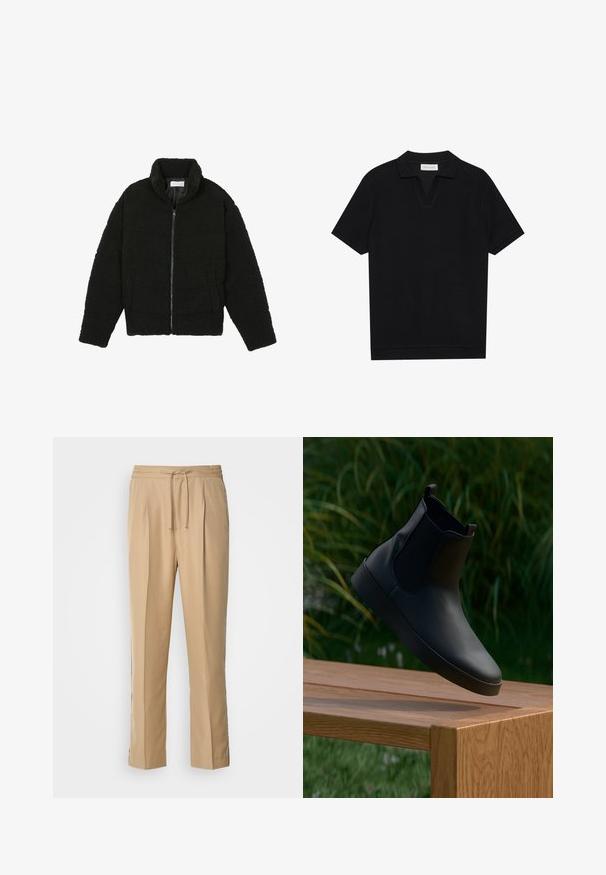 Schwarze Kunstpelzjacke mit hohem Kragen, Reißverschluss, elastischen Bündchen und gestepptem Design. Verfügt über seitliche Taschen und eine weiche Textur.; Schwarzes Kurzarm-Polohemd aus texturiertem, geripptem Stoff, mit einem V-Ausschnitt und geradem Saum. Keine sichtbaren Logos oder Muster.; Helles beigefarbene Hosen aus glattem Stoff, mit einem elastischen Bund, zwei Falten vorne und geraden, lockeren Beinen für Komfort.; Schwarzlederne Knöchelstiefel mit elastischen Seitenpanelen, glatter Textur, runder Zehe und flacher Sohle, platziert über einem Holztisch vor grüner Kulisse.