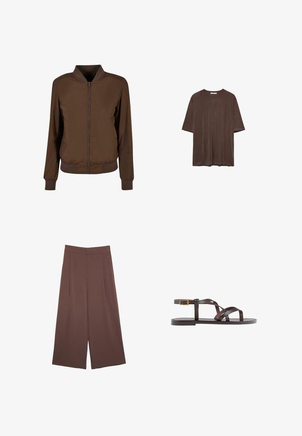 Smeđi bomber jakna s patentnim zatvaračem sprijeda, rebrastim manžetama i rubom. Izrađena od glatkog, laganog materijala s bočnim džepovima.; Smeđa majica kratkih rukava od mekog materijala, s okruglim izrezom i opuštenim krojem. Glatka tekstura bez uzoraka ili ukrasa.; Smeđe hlače širokog kroja s glatkom teksturom, koje imaju visok struk i nabore sprijeda. Tkanina je lagana i slobodno se kreće.; Smeđe kožne sandale s iskrižanim trakama, umetkom za zapešće s kopčanjem i ravnim potplatom s minimalnim detaljima šivanja.