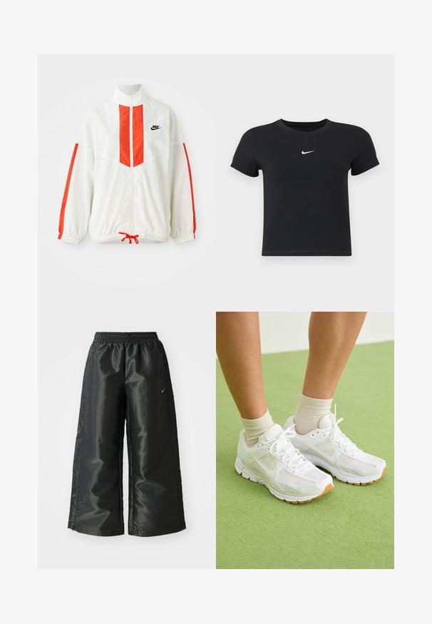Hvit vindjakke med røde vertikale striper og snor i kanten. Har høy hals og glidelås foran. Nike-logo på brystet.; Svart T-skjorte med kort arm laget av bomull med rund hals. Har en hvit Nike-logo på brystet, minimalistisk design og tettsittende fasong.; Svarte treningsbukser med en blank, glatt stoff, som har et elastisk liv, vide ben og en liten logo på venstre side.; Hvite sportssko med mesh-stoff, gummisåler og beige detaljer. Brukt med lyse sokker på en grønn overflate.