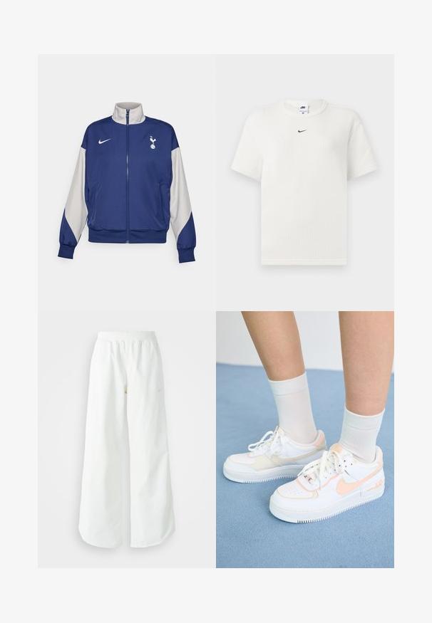 Jachetă cu fermoar de culoare bleumarin, cu mâneci gri, având un guler înalt, logo-ul Nike și emblema Tottenham Hotspur. Fabricată dintr-un material neted.; Tricou alb cu dungi, cu guler rotund și mâneci scurte. Prezintă un mic logo negru Nike pe piept. Material texturat cu o formă ajustată.; Pantaloni atletici largi, alba, cu un talie elastica texturata si detalii subtile cu logo. Material neted, cu o croiala lejera si tiv conformat.; Adidași albaștri cu accente piersici, superior din piele netedă, vârf perforat, talpă texturată și șireturi. Purtați cu șosete albe până la glezna pe o suprafață albastră.