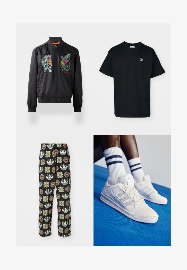Giacca bomber nera con polsini a coste, caratterizzata da colorati ricami di un personaggio e di un alligatore sul davanti. Chiusura con cerniera.; T-shirt in cotone nero con collo rotondo e maniche corte, caratterizzato da un piccolo logo bianco Adidas sul lato sinistro del petto.; Pantaloni neri con un motivo intricato di varie forme, tra cui design floreali e righe in arancione, verde e bianco.; Sneaker bianchi in pelle con dettagli perforati, tre strisce metalliche e un pannello laterale testurizzato. Indossati con calzini bianchi con strisce blu.