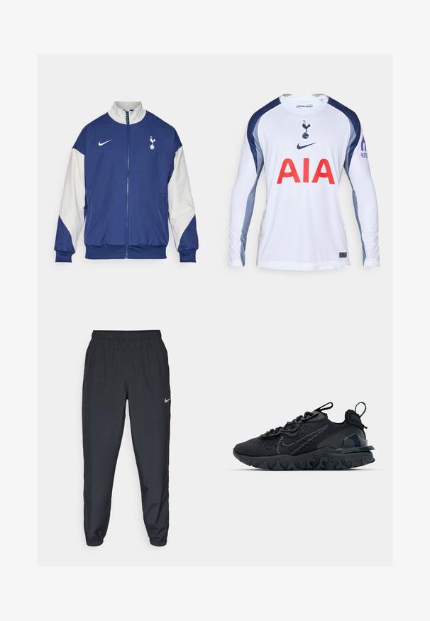 Námořnická modrá bunda s bílými rukávy, celopropínací, s vysokým límcem, logo Nike a emblém Tottenham Hotspur na levé hrudi.; Bílé fotbalové tričko s dlouhým rukávem a námořnickými modrými akcenty, se znakem Tottenham Hotspur a nápisem "AIA" červeně napsaným přes přední stranu.; Černé tepláky vyrobené z lehkého materiálu s elastickým pasem, manžetami na kotnících a diskrétním logem Nike na levé straně.; Černá sportovní bota s prodyšným síťovaným svrškem, texturovanými akcenty a vlnkovou gumovou podrážkou. Obsahuje reflexní logo a systém šněrování.