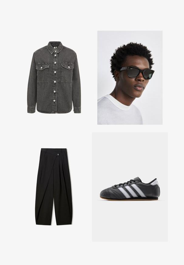 Czarna denimowa kurtka w odcieniu ciemnoszarym z zapięciem na guziki, dwoma kieszeniami na piersi oraz złożonym kołnierzem. Teksturowana tkanina z widocznymi detalami szwów.; Top na halter w jasnym żółtym kolorze z pionowymi paskami, z głębokim dekoltem w serek i zapięciem na guziki z przodu. Gładki materiał z dopasowanym krojem.; Czarne spodnie szerokie z gładkiego materiału, z przodu z plisami, zapinane na guzik, zaprojektowane w zwężający sposób dla uzyskania zdefiniowanej sylwetki.; Czarne sportowe buty skórzane z białymi paskami, okrągłym noskiem, płaską podeszwą i sznurowaniem. Posiada perforacje umożliwiające oddychanie.; Czarne okulary przeciwsłoneczne Ray-Ban w kwadratowej oprawie, ciemne soczewki i srebrne akcenty. Model nosi jasnoszary sweter z okrągłym dekoltem.