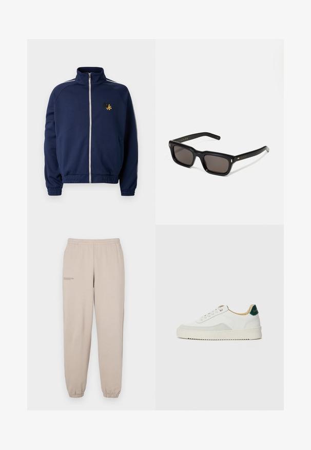 Mornarska športna jakna z visokim ovratnikom, polnim zadrgo, belimi bočnimi črtami in vezenim logotipom v rumeni in črni barvi na prsih.; Bela dolg rokav srajca s gumbi iz bombaža. Ima klasičen ovratnik, gumbnice na zapestjih in majhen temno moder vezen logotip na prsih.; Bežne hlače iz bež barve, izdelane iz mehkega materiala, z elastičnim pasom in manšetami ter z majhnim natisnjenim napisom na levi nogi.; Bela trenerka z zaključki iz semiša, okroglo konico, ravne vezalke in kremna gumijasta podplata. Ima zeleno blagovno znamko na peti.; Črne pravokotne sončna očala s temnimi lečami, debelim plastičnim okvirjem, zlatimi detajli na templjih in izgravirano blagovno znamko na ročaju.