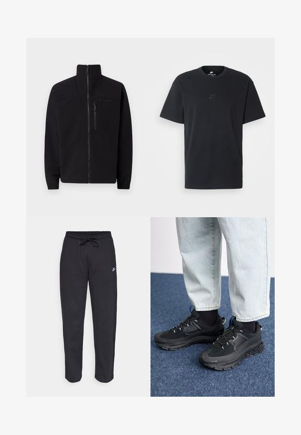 Casaco softshell preto com colarinho levantado, fecho frontal e bolso no peito com fecho éclair. Apresenta punhos elásticos e uma textura suave.; T-shirt de algodão preto da Nike com um clássico decote redondo, mangas curtas e um logótipo em relevo discreto no peito. Textura suave.; Calças de treino pretas feitas de tecido suave, com faixa elástica na cintura, cordão regulador e um pequeno logótipo da Nike na coxa esquerda.; Sapatilhas desportivas pretas com tecido texturizado e solas em borracha, apresentando atacadores elásticos e um detalhe azul no calcanhar. Usadas com calças de ganga claras.