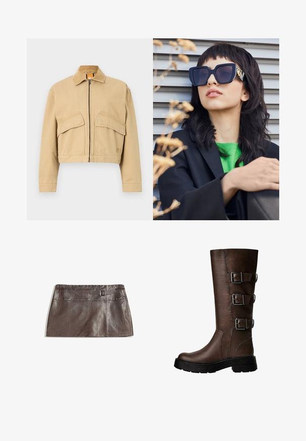 Rövidített bézs dzseki, kordbársony gallérral, elülső cipzárral és két nagy hajtókás zsebbel. Strapabíró pamut anyagból készült.; Rövidített fehér ing, hegyes gallérral, hosszú ujjakkal és sima textúrával. Elöl gombos záródás, az inghez illő gombokkal.; Barna bőr mini szoknya, szegecselt derékrésszel és csatos övhurkokkal, sima textúrával és letisztult, egyenes fazonnal.; Barna bőr térdig érő csizma három fém csattal, texturált felület, kerek orr és vastag talp a stabilitás érdekében.; Túlméretezett fekete napszemüveg vastag kerettel és arany díszítéssel, fekete blézerral és élénk zöld inggel viselve, vízszintes háttér előtt.; Barna bőr hobo táska, laza fazonú és sima textúrájú. Egy modell viseli hétköznapian, nagy nyílással és lekerekített formával.