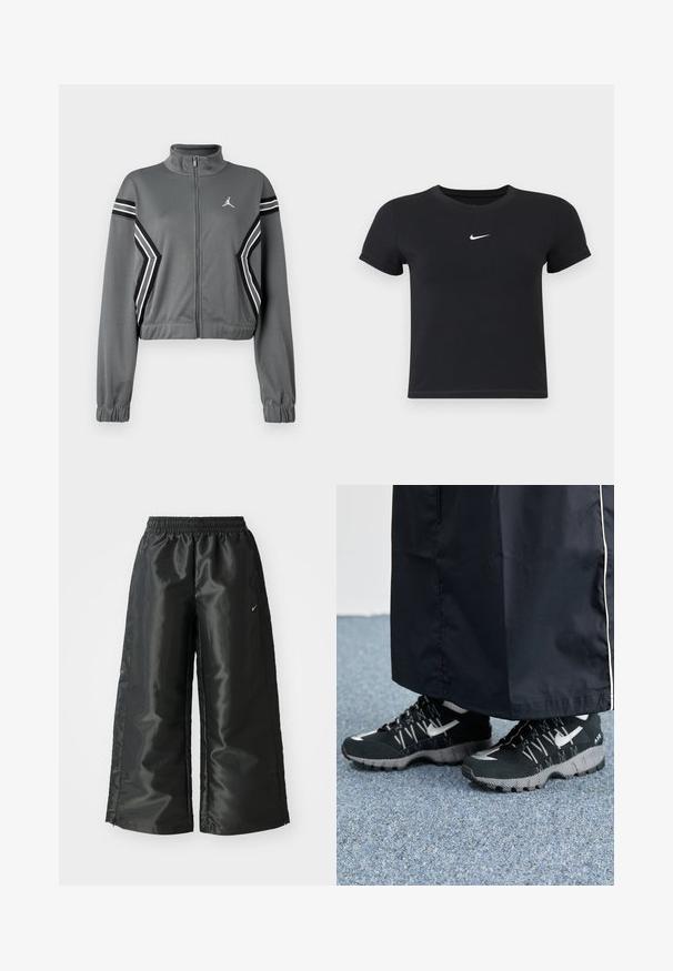 Grijze, korte trainingsjack van gladde stof met een hoge kraag, ritssluiting aan de voorkant en zwart-witte strepen op de mouwen. Heeft een logo op de borst.; Zwarte katoenen t-shirt met korte mouwen en ronde hals. Voorzien van een wit Nike-logo op de borst, minimalistisch ontwerp en een aansluitende pasvorm.; Zwarte sportbroek van een glanzende, gladde stof, met een elastische tailleband, wijde pijpen en een klein logo aan de linkerkant.; Zwarte atletische schoenen met een gestructureerde bovenkant, zilveren accenten en een gestippelde loopzool, gecombineerd met een zwart lang kledingstuk. Geplaatst op een blauwe vloerbedekking.