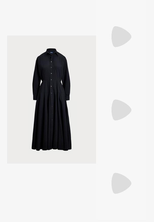 Veste preta de botão feita de tecido leve. Apresenta um colarinho, mangas longas, saia ampla e um design de frente com botões.; Botas pretas até ao joelho, feitas de um material liso, com um salto bloco robusto, bico arredondado e detalhes de costura discretos.; Mala de couro castanho com um acabamento texturizado e ferragens prateadas, segurada com uma mão ao lado de uma saia de couro castanho e um suéter com padrão.; Brincos em metal dourado com forma de arco alongado e curvado. Apresentam uma superfície lisa e brilhante, com uma ponta arredondada para um detalhe adicional.