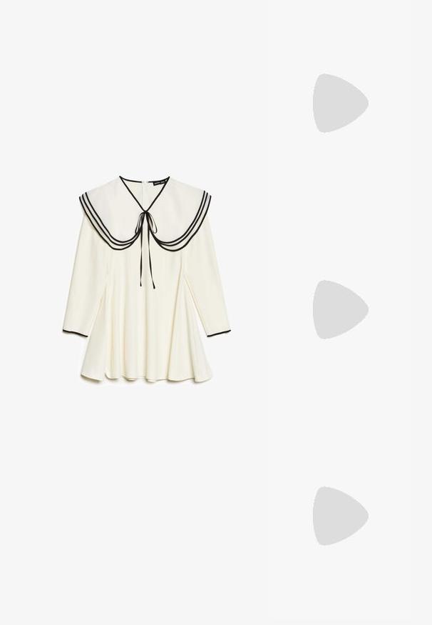 Haut sans manches noir en coton ; présente un design avec un papillon argent métallique et un motif tribal sur la poitrine. Encolure ronde.; Robe crème à manches longues avec un large col marin orné de bordures noires et d'un nœud, jupe plissée, et finitions noires aux poignets.; Bottes noires en cuir, hautes jusqu'au genou, avec un bout pointu et un talon aiguille haut. Texture lisse et design épuré, avec un minimum de détails.; Sac à main métallisé argenté au design structuré, avec une poignée supérieure et un détail en nœud sur le devant. Texture lisse, fini réfléchissant.; Boucles d'oreilles en métal doré avec une forme triangulaire lisse et arrondie et un design à attache de tige ; surface réfléchissante avec un minimum de détails.