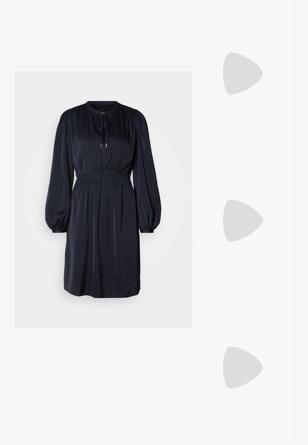 Navy blue, long-sleeve dress with a gathered waist, round neckline, and drawstring tie. Made of smooth, lightweight fabric.; Pointed-toe slingback shoe in off-white leather, featuring a low heel and cut-out design with a smooth texture and minimal accents.; Cream-colored handbag with a textured finish, curved shape, short handle, and gold-tone logo detail. Zipper closure at the top.; Silver metal hoop earrings with a smooth, shiny surface and a structured, rounded design. Features a hinged clasp for secure wear.