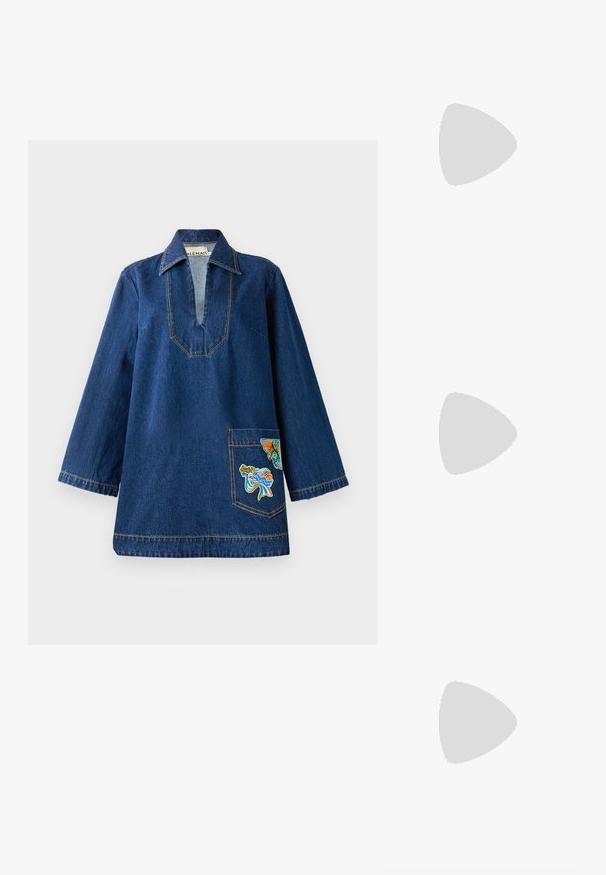 Denim tunic with a deep V-neck, long sleeves, contrasting yellow stitching, and an embroidered pocket featuring colorful designs.; Tan heeled sandal with a square toe, two dark brown straps, and a gold buckle. Features a stacked block heel and smooth leather texture.; Black oversized sunglasses with a geometric shape, gradient lenses, and gold accents on the arms. Made from durable plastic material.; Gold-tone metal hoop earrings with a curved, elongated shape. Features a smooth, shiny surface and a rounded tip for added detail.