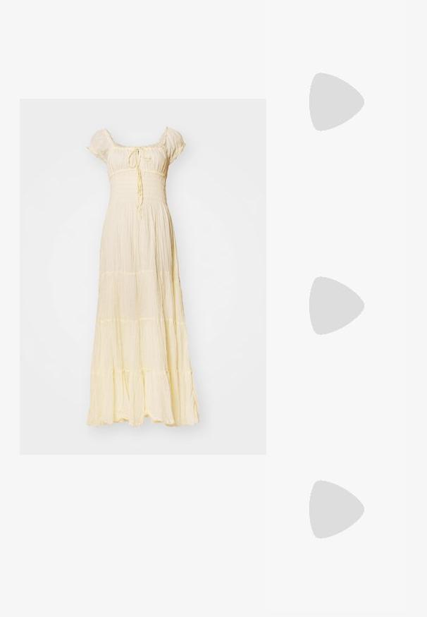 Maksikleita gaiši dzeltenā krāsā, izgatavota no krunkota auduma. Tam ir īsas pūkainas piedurknes, slīpēts bodijs, sasienama priekšpuse un pakāpeniska apakšmala.; Zeltaini, metāla kurpes ar siksniņām, norakans purngalis un masīla papēdis. Gluda tekstūra, minimālisma dizains un šaura siksna.; Dzeltena mākslīgā krokodila roku soma ar strukturētu dizainu, augšējo rokturi, noņemamu ķēdes siksniņu un dekoratīvām kristāla rotājumiem aizdares daļā.; Zeltīti metāla auskari ar gludu, izliekta dizaina. Ar atšķirīgu smailu formu, pulētu virsmu un eņģu aizdari.