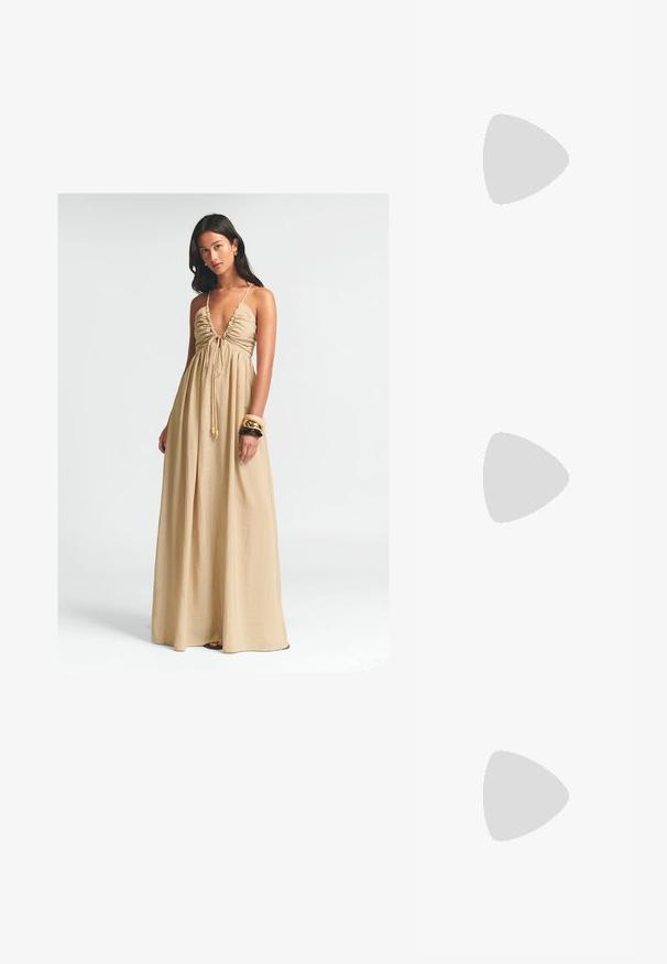 Pitkä, beige maksimekko, jossa on syvä V-mallinen kaula-aukko, rypytetty rintaosa ja säädettävä nauha. Kevyt kangas laskeutuu vapaasti lattiaan.; Bershka Korolliset sandaalit - black; Kaurisilmät, joissa on pyöreä, jämäkkä kehys ja ruskeat linssit. Ominaisuuksiin kuuluvat hillityt kuviot sekä suorat, kapenevat sangan osat.; Vaaleanbeige nahkainen käsilaukku, jossa on ainutlaatuinen muoto, varustettuna kahdella lyhyellä kahvalla ja yhdellä pitkällä säädettävällä hihnalla. Sujuva pinta ja vähän metalliosia.