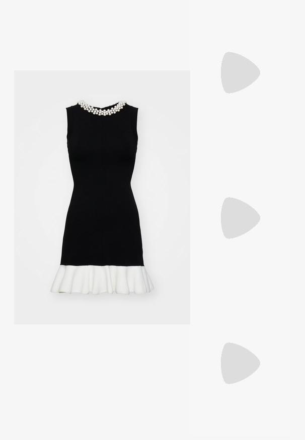 Melnas bezpiedurkņu kleitas, kurai ir perlām rotāts kakla izgriezums un baltas ķemmētas apakšmalas. Gluda tekstūra un pieguļoša dizaina.; Baltas ādas sporta apavi ar gaiši ziliem akcentiem, pelēka zamša purngala un brūnas gumijas zole. Iezīmē trīs zilas svītras un "Samba" zīmolu.; Melnas saulesbrilles ar brūnā tonītiem stikliem; taisnstūra forma ar biezu rāmi, ieskaitot smalku aparatūru akcentu uz tempļiem.; Melnas ādas plecu soma ar apaļu formu, spīdīgu apdari un sudraba komponentēm. Persona valkā melnus platā piegriezuma bikses un vadlīniju mokasīnus ar kniedēm.