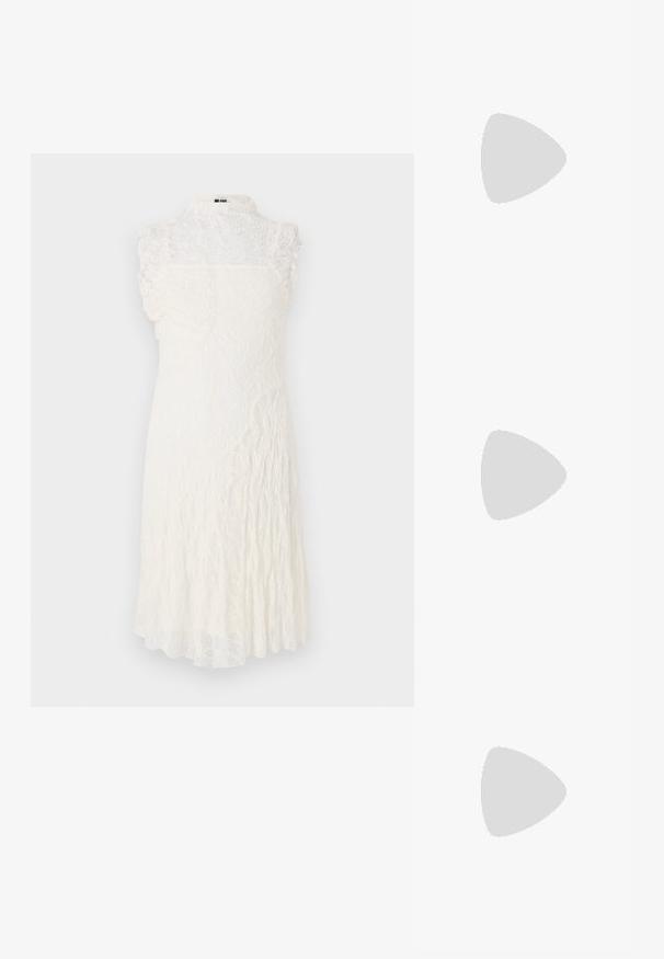Lace dress with a high collar, sleeveless design, and a flared silhouette. Color is off-white with a textured, patterned finish.; Black patent leather pump with a pointed toe, ankle strap, and a chunky heel. Smooth texture with a shiny finish.; White leather handbag with a curved shape, adjustable strap, and a small buckle detail. Model wears a fitted black outfit.; Gold-tone ring featuring an organic, twisted design with smooth texture and tapered ends, creating a modern, sculptural appearance.