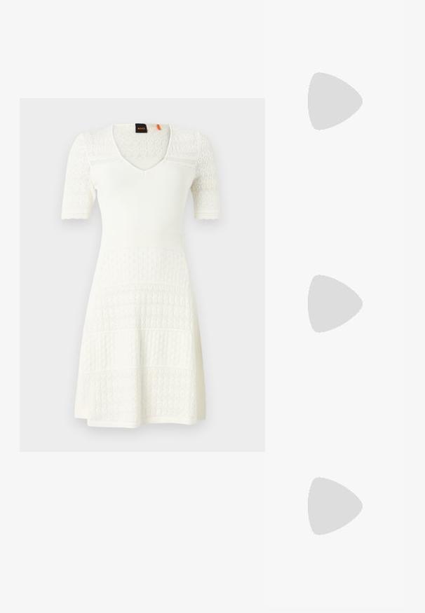 White knitted dress with short sleeves, V-neck, textured patterns, and a flared hem. Features patterned design across sections.; Black high-heeled sandals feature thin straps with a knotted design, a smooth square toe, and a sleek stiletto heel.; Light gray metallic handbag featuring a chain strap, embellished with small circular metallic studs and a triangular brand logo.; Silver hoop earrings with a smooth, shiny finish. Rounded shape, lightweight design, featuring a post-back closure.
