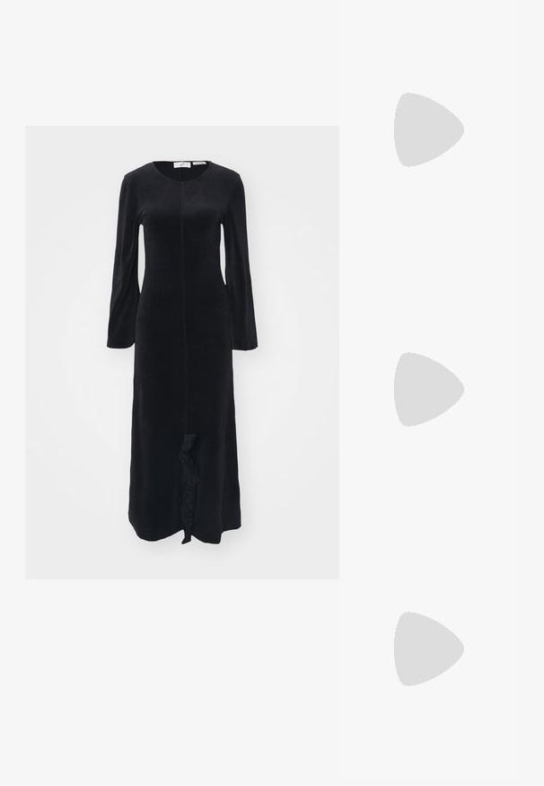 Black long-sleeved dress made of soft fabric, featuring a round neckline, slim fit, and a frill detail at the hem. Smooth texture throughout.; Black leather slip-on mules with a pointed toe, gathered texture, and a small kitten heel. Features a drawstring detail at the opening.; Small black leather handbag with a rounded shape, top handle, and removable strap. Worn with black fabric dress and black pleated shoes.; Green acrylic hoop earrings in an octagonal shape with faceted edges, featuring a metallic clasp for securing.
