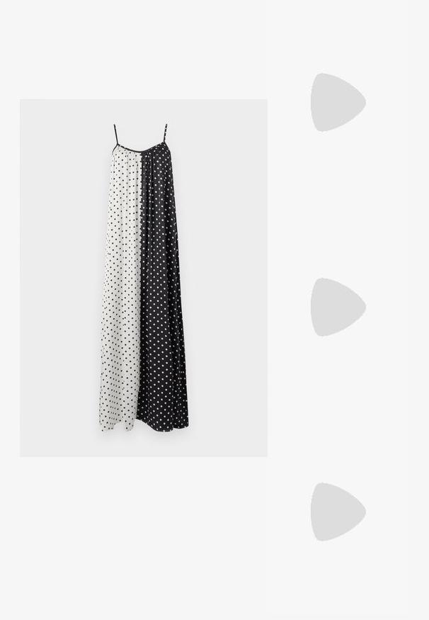 Sleeveless, long dress featuring a split design with black and white sections, each adorned with small polka dots. Lightweight fabric.; Black leather ballet flats with a pointed toe, strap with silver buckle, paired with black tailored pants featuring a slit hem.; Yellow pleated handbag made of smooth faux leather, featuring a soft shape with a single shoulder strap and gathered top design.; Silver metal earrings with a wavy, sculptural design featuring a polished finish and irregular shapes, highlighting a contemporary aesthetic.