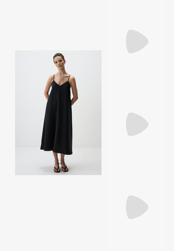 Jimmy Key LOOSE FIT V-NECK MIDI  - Jurk - black; Korte, witte katoenen t-shirt in cropped stijl met korte mouwen, met grafische afbeelding van een gele palmboom en blauwe golf op de linkerborst.; Witte hoge hakken sandaal met een chunky hak, met een bandjesontwerp en enkelband. Gladde textuur met een plateau voor extra hoogte.; Beige handtas gemaakt van zacht materiaal, met een slonzig ontwerp, gestikte details en twee schouderbanden. Geschikt voor dagelijks gebruik.