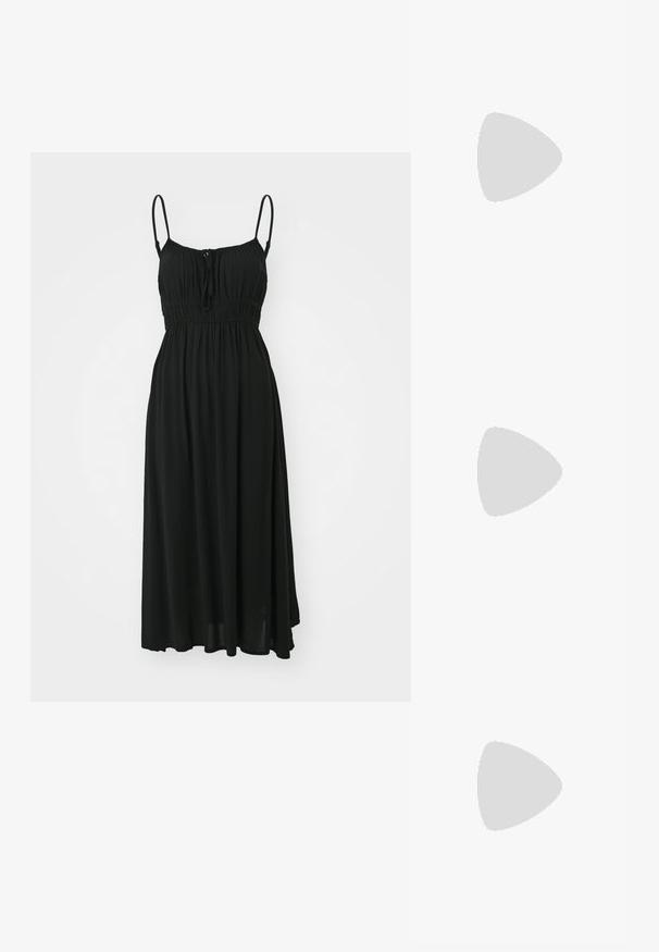 Roxy SKIES SOLID - Robe de jour - anthracite; Botte de combat en cuir noir avec un bout rond, un laçage à l'avant et une sangle au niveau de la cheville. Dispose d'une semelle en caoutchouc épaisse pour une durabilité optimale.; Des lunettes de soleil noires en forme de chat avec une finition mate, arborant un design élégant et des bords légèrement arrondis, posées sur des vêtements sombres d'un mannequin.; Boucles d'oreilles en argent avec une finition lisse et polie. Forme ronde et fermeture à clip sécurisée. Design léger adapté pour un port quotidien.