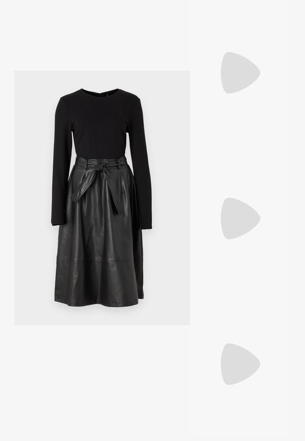 Top negro de manga larga combinado con una falda negra de cuero sintético, con una cintura atada y una textura suave y brillante.; Botas de vaquero de cuero marrón con punta afilada y tacón cuadrado, que presentan costuras detalladas y acentos elevados en el caño.; Bolsa de pouch metálica plateada con una forma suave y redondeada y un cierre en la parte superior con un nudo. Hecha de un material de imitación de cuero suave.; Pendientes de aro de plata con diseño retorcido, que presentan un acabado pulido y cierre de presión. Miden aproximadamente 3 cm de diámetro.