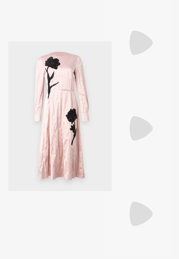 Pink dress with a textured finish, featuring black floral embroidery on the bodice and skirt, long sleeves, and a round neckline.; Black leather ballet flat with a rounded toe, smooth texture, minimal stitching detail, and a flexible sole design.; Black leather half-moon bag with a gold hardware accent, featuring a zip closure. Worn crossbody over a gray sweater.; Gold-tone knot stud earrings with a twisted design. Each earring features a circular clear backing for secure wear.