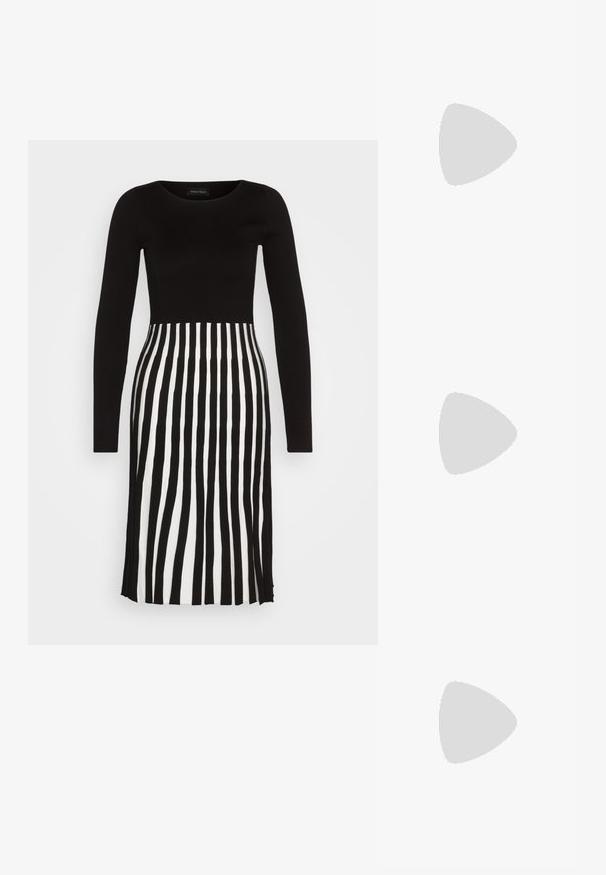 Anna Field Kampsunkleit - black/white; Must mustaapp, millel on terav nina ja madal blokk-kand. Omab pahkluu rihma koos kuldse tooni pandlaga. Sile tekstuur.; Mustad ümarad päikeseglaasid, millel on gradient objektiivid, paksud raamid ja kuldse tooni kettaga kaunistused tempelitel.; Must musta kott, millel on struktureeritud kuju, sile tekstuur ja metallist klamber. Kombineeritud laiate mustade pükstega ja avatud varvaste sandaalidega puidust põrandal.