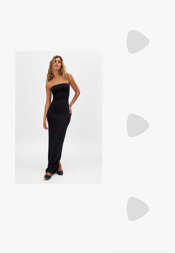 Schwarzes, trägerloses, enganliegendes Maxikleid mit glatter Textur und bodenlangem Design. Getragen mit schwarzen Ballerinas. Schlichtes, elegantes Aussehen.; Schwarze Leder-Kitten-Heel-Sandale mit dünnen Riemen, goldener Schnalle und minimalistischer Zehen-Schlaufe vor einem weißen Hintergrund.; Quadratische Sonnenbrillen mit braunen Gläsern und einem dünnen schwarzen Metallrahmen. Verfügt über schräg gestaltete Bügel und verstellbare Nasenpads für zusätzlichen Komfort.; Braune Leder-Crossbody-Tasche mit geschwungener Form, goldfarbenen Beschlägen und einer Schnallenakzentuierung. Verfügt über einen abnehmbaren Schultergurt.