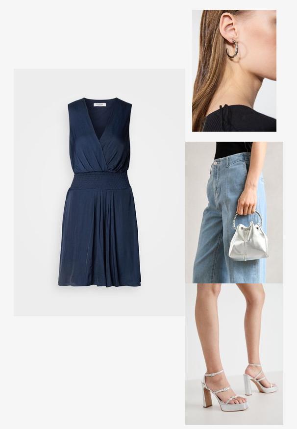 Vestido sem mangas azul marinho com decote em V profundo, cintura franzida e saia rodada. Feito de tecido suave, com uma textura sutil.; Sandálias de salto alto prateadas, de plataforma, com tiras no tornozelo, material texturizado, salto bloco largo e fivelas ajustáveis.; Saco de balde prateado metálico com um acabamento texturizado, adornado com uma pega redonda prateada e fecho de cordão, segurado contra jeans azul claro.; Brinco de argola prateada com acabamento polido, apresentando pequenos detalhes em dourado e uma forma redonda, usado na orelha.