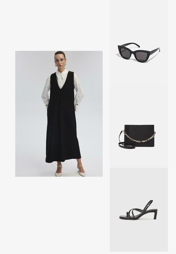 Donna che indossa un lungo abito nero senza maniche sopra una camicia bianca con grandi polsini e bottoni dorati, abbinato a tacchi bianchi a punta.; Sandalo nero con cinturini, dalla punta squadrata e tacco basso a blocco. Presenta diversi cinturini sottili e una cinturini regolabile alla caviglia. Realizzato in pelle liscia.; Occhiali da sole neri a forma di occhio di gatto con finitura opaca, dotati di lenti grigie, angoli acuti e stanghette slanciate. Nome del marchio visibile all'interno della stanghetta.; Borsa a tracolla nera in pelle con una texture liscia, forma rettangolare e dettaglio in catena metallica sul davanti. Inclusa una tracolla regolabile.