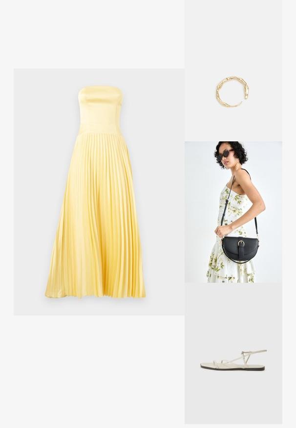 Bezplecu maksi kleita gaismā dzeltenā satīnā. Tam ir pieguļošs korpuss un krokota svārku daļa. Gluda tekstūra ar plūstošu siluetu.; Bežīgas plakanas čības ar vairākiem plāniem siksniņām un regulējamu sprādzi. Zole ir plakana ar nelielu tumšu kontrastu malā.; Melnas ādas rokassoma ar izliekta formu, noņemamu siksnu un zelta aksesuāriem. Somai ir vāciņš ar sprādzes detaļu.; Zelta toņa gredzens ar organisku, vērptu dizainu, gludu virsmu un sašaurinātiem galiem, radot mūsdienīgu, skulpturālu izskatu.