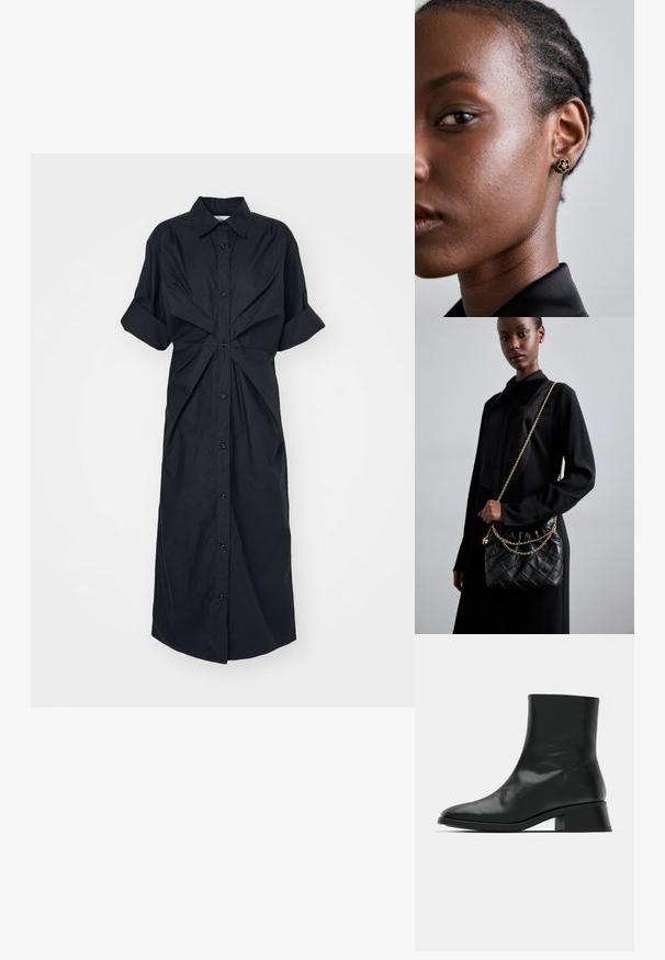 Rochie neagră din material ușor, cu mâneci scurte rulate, deschidere cu nasturi și detaliu de țesut la talie.; Cizma neagră până la gleznă, din piele lucioasă, cu un design elegant, vârf ascuțit și un toc bloc moderat pentru stabilitate.; Geantă de mână din piele quinoa neagră, cu vârf adunat, curea din lanț auriu și formă rectangulară, ținută pe un fundal simplu.; Cerceii cu studs florali de aur au un centru texturat de culoare neagră și detalii delicate. Pielea clară a modelului și părul împletit sunt vizibile în profil.