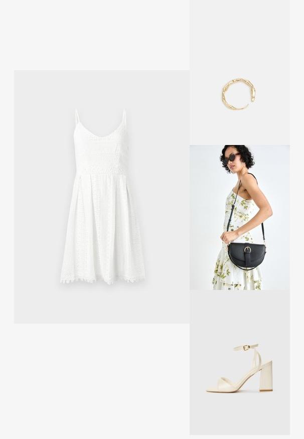Vit spetsklänning med figursydd överdel och utställd kjol. Har tunna axelband, V-ringning och intrikata blommönster.; Krämfärgade klacksandaler med öppen tå, tjock blockklack, smal ankelrem och diskret glansig finish. Spänne som accent på remmen.; Svart läderhandväska med en böjd form, avtagbar rem och guldiga detaljer. Väskan har ett lock med en spänndetalj.; Ring i guldutförande med en organisk, vriden design, slät yta och avsmalnande ändar, vilket ger ett modernt, skulpturalt utseende.