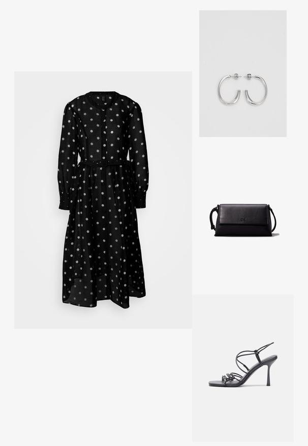 Vestido negro de manga larga hecho de tela transparente, con lunares blancos, abertura delantera con botones y una cintura ceñida para una silueta definida.; Las sandalias negras de tacón alto presentan finas correas con un diseño anudado, una punta cuadrada suave y un elegante tacón de aguja.; Bolso clutch de cuero negro con forma rectangular, textura suave, cierre plano y un pequeño asa en el lateral. Presenta un sutil logo.; Aros de plata en forma de aro con un acabado liso y brillante. Diseño redondeado y ligero, con cierre de tipo post-back.
