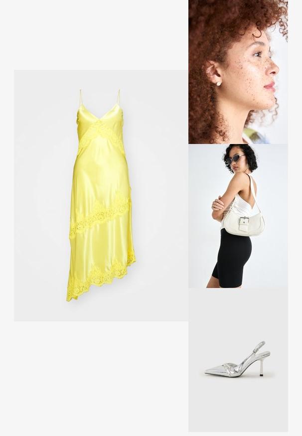 Gul satinklänning med spetsdetaljer, med V-ringning, tunna axelband och en asymmetrisk fåll. Slät textur.; Silver slingback högklackad sko med spetsig tå, metallisk finish, två dekorativa remmar och en smal klack med svart spets.; Vit läderhandväska med en böjd form, justerbar rem och en liten spänndetalj. Modellen bär en åtsittande svart outfit.; Guldörhängen med en cirkelformad design, omgivna av små klara stenar. Lockigt, rödbrunt hår och en slät hy med fräknar.