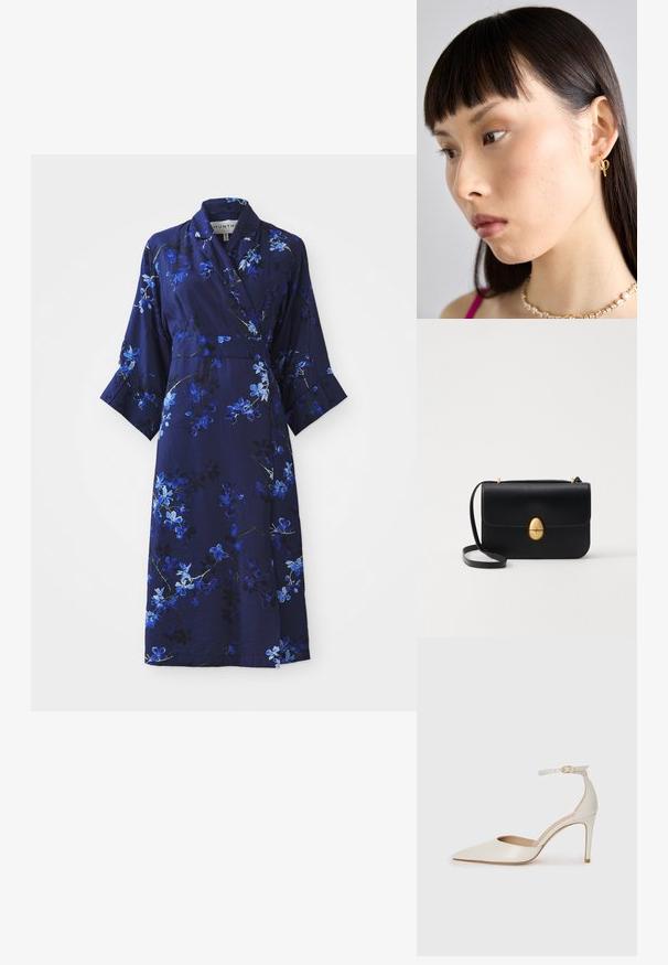 Tumesinine lillemustriga ümbrikkleit kolmeveerand varrukatega, millel on sinised ja valged lillemuster, pehme kangas ja vöödetael.; Valgete nahast kõrge kontsaga kingad, terava varbaga, ankle strapiga ja kitsaste stiletto kontsadega. Sile tekstuur koos peene läikega.; Must kase nahast käekott, millel on struktureeritud ristkülikukujuline kuju. Omab kuldset ovaalset lukku ja õhukest õlavarre rihma. Sile tekstuur.; Kuldne rõngasse ehe, kantud paremal kõrvas, omab avatud disaini. Modellil on sirged, tumedad juuksed ja minimaalne meik.