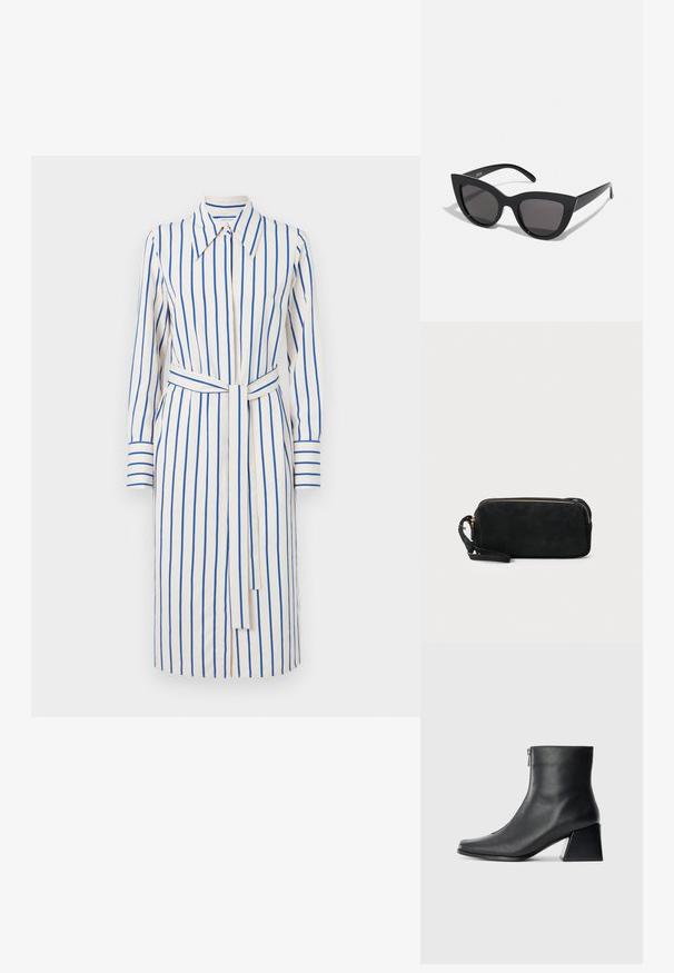 Tiger of Sweden LEONNE - Blousejurk - buttercream; Zwarte leren enkellaars met vierkante neus, zijrits en blokhak tegen een effen lichte achtergrond.; Zwarte cat-eye zonnebril met een matte afwerking, voorzien van grijs getinte glazen, scherpe hoeken en slanke zijarmen. Merkennaam zichtbaar op de binnenarm.; Zwarte suède clutchtas met een ritssluiting en een afneembare polsband. Voorzien van goudkleurige hardware en een gladde, matte textuur.