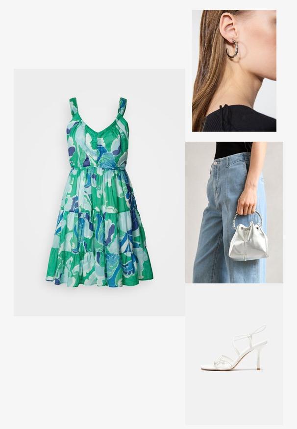Suknja brez rokavov z v-vratom, plastena krila, s cvetličnim vzorcem v zelenih, modrih in vijoličnih odtenkih na lahkem materialu.; Bela sandala na visoki pet z zavezanimi trakovi, z ravnim podplatom, teksturirano sprednjo stranjo z nabranimi detajli in ozkim gležnjenjem.; Metalna srebrna torba na ramenu z zrnato površino, okrašena s srebrnim okroglim ročajem in zapiranjem na vrvico, držana ob svetlo modrih džinsih.; Srebrna obročasta uhana s polirano površino, ki vključuje majhne zlate poudarke in okroglo obliko, nošena na ušesnem lobu.
