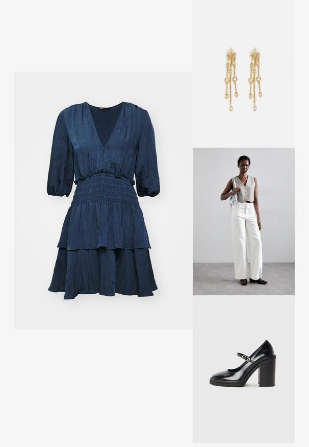 Navyblaues Kleid mit V-Ausschnitt, Ballonärmeln und gerafftem Bund. Besitzt einen gestuften Rock mit strukturiertem Stoff.; Schwarzer Lackleder-High-Heel-Schuh mit runder Zehenform, Knöchelriemen, silberner Schnallenverzierung und einem klobigen Blockabsatz.; Grauer, verkürzter Weste mit Knöpfen, kombiniert mit weißen, weit geschnittenen Jeans und schwarzen flachen Schuhen. Ergänzt durch eine kleine silberne Fransenhandtasche.; Goldtonige Ohrringe mit mehreren kaskadierenden Ketten, verziert mit klaren ovalen Strasssteinen und dekorativen Ohrsteckern.